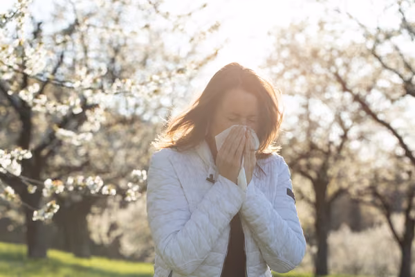 Hayfever - woman sneezing