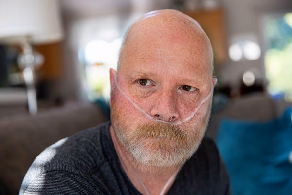 Man with oxygen in nose