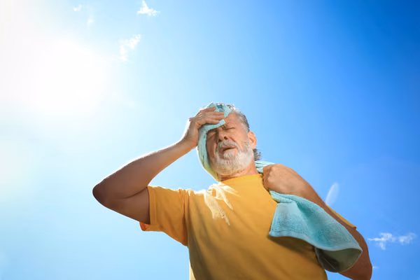 Man in hot summer sun