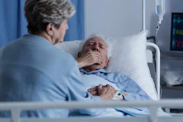 Elderly patient hospital bed